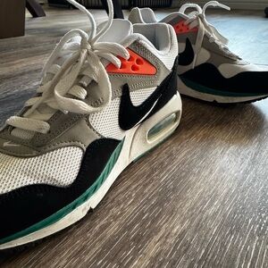 Nike Air Max with Black, White, and Orange Accents